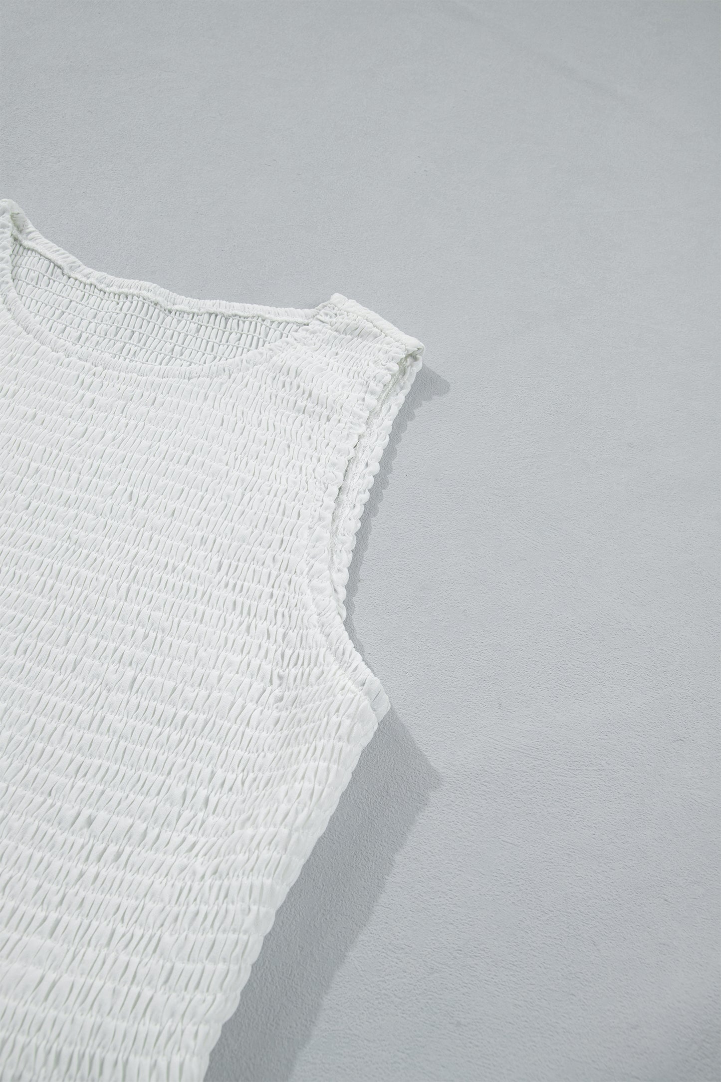 Smocked Peplum Top