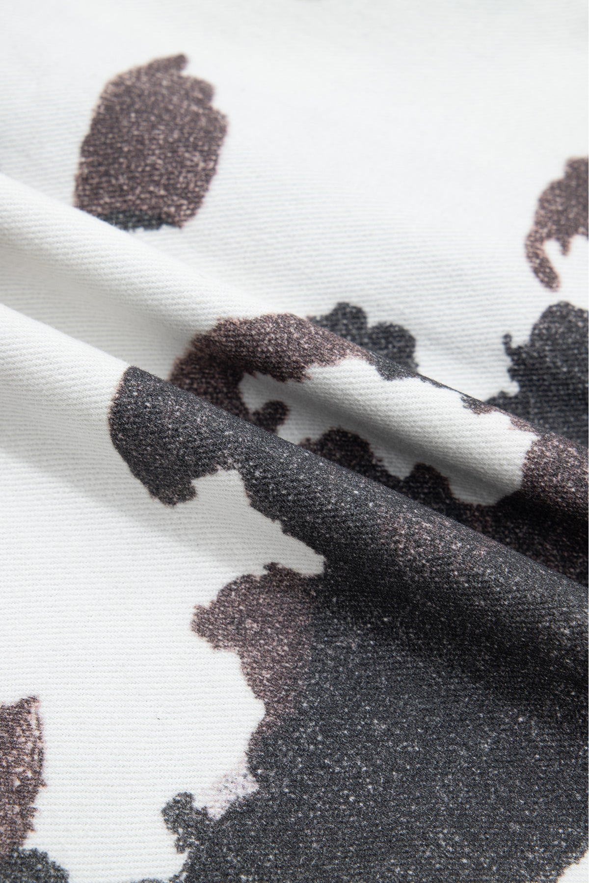 Cow Print Button-Up Denim Jacket
