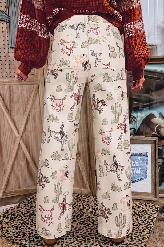 Women's Western print straight-leg jeans featuring cowboys, horses, and cactus desert motifs
