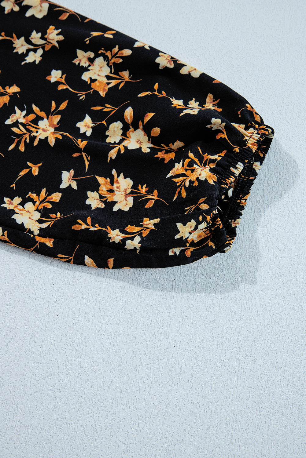 Black Floral Smocked Top